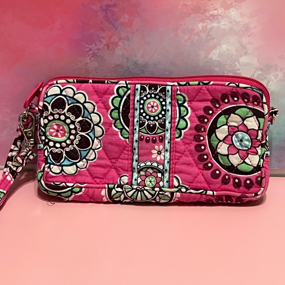 Pink Vera Bradley Wristlet used but in good condition. No rips or stains.